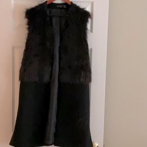 Women’s vest, no tags but never worn.  Faux Fur at top
